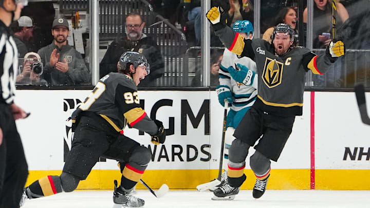 Nov 29, 2025; Las Vegas, Nevada, USA; Vegas Golden Knights right wing Mitch Marner (93) celebrates with Vegas Golden Knights right wing Mark Stone (61) after scoring a goal against the San Jose Sharks during the second period at T-Mobile Arena. Mandatory Credit: Stephen R. Sylvanie-Imagn Images