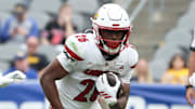 Sep 27, 2025; Pittsburgh, Pennsylvania, USA;  Louisville Cardinals running back Duke Watson (26) runs the ball against the Pittsburgh Panthers during the fourth quarter at Acrisure Stadium. Mandatory Credit: Charles LeClaire-Imagn Images