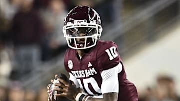 Nov 30, 2024; College Station, Texas, USA; Texas A&M Aggies quarterback Marcel Reed (10) looks to pass the ball during the first half against the Texas Longhorns at Kyle Field. Mandatory Credit: Maria Lysaker-Imagn Images 