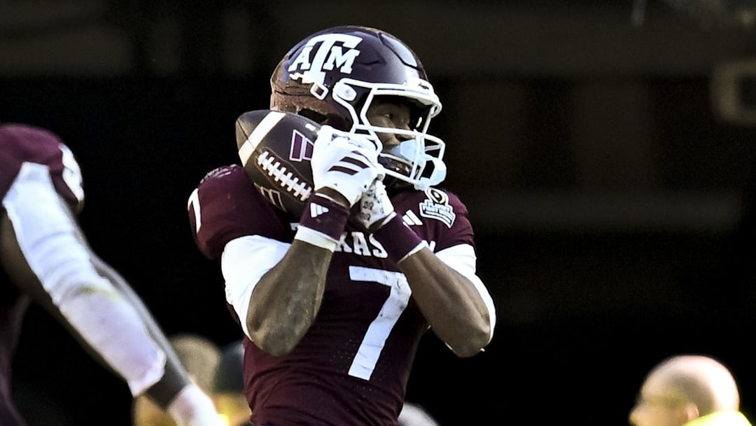 Dec 20, 2025; College Station, TX, USA; Texas A&M Aggies wide receiver KC Concepcion (7) catches a pass during the fourth quarter against the Miami Hurricanes at Kyle Field. Mandatory Credit: Maria Lysaker-Imagn Images