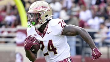 Apr 20, 2024; Tallahassee, Florida, USA; Florida State Seminoles running back Roydell Williams (24) runs the ball during the Spring Showcase at Doak S. Campbell Stadium. Mandatory Credit: Melina Myers-Imagn Images