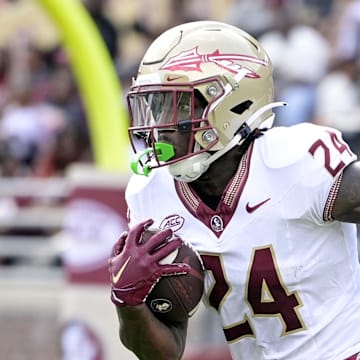 Apr 20, 2024; Tallahassee, Florida, USA; Florida State Seminoles running back Roydell Williams (24) runs the ball during the Spring Showcase at Doak S. Campbell Stadium. Mandatory Credit: Melina Myers-Imagn Images