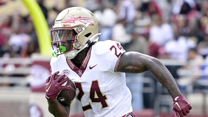 Apr 20, 2024; Tallahassee, Florida, USA; Florida State Seminoles running back Roydell Williams (24) runs the ball during the Spring Showcase at Doak S. Campbell Stadium. Mandatory Credit: Melina Myers-Imagn Images