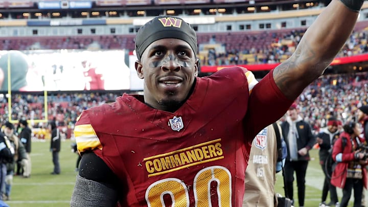 Dec 22, 2024; Landover, Maryland, USA; Washington Commanders safety Quan Martin (20) celebrates after the Washington Commanders beat the Philadelphia Eagles at Northwest Stadium. Mandatory Credit: Peter Casey-Imagn Images Dec 22, 2024; Landover, Maryland, USA; Washington Commanders safety Quan Martin (20) celebrates after the Washington Commanders beat the Philadelphia Eagles at Northwest Stadium. Mandatory Credit: Peter Casey-Imagn Images