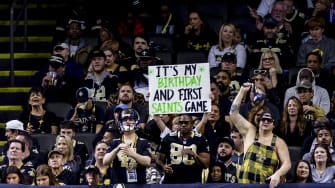 Dec 10, 2023; New Orleans, Louisiana, USA; A Saints fan holds up a sign during the first half at the
