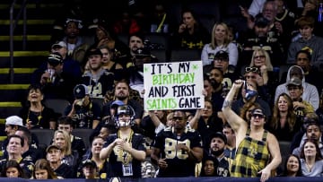 Dec 10, 2023; New Orleans, Louisiana, USA; A Saints fan holds up a sign during the first half at the