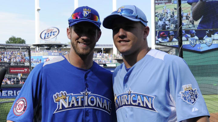 July 9, 2012; Kansas City, MO, USA; American League outfielder Mike Trout (right) of the Los Angeles Angels poses for a photo with National League outfielder Bryce Harper (left) of the Washington Nationals during practice for the 2012 All Star Game at Kauffman Stadium.  