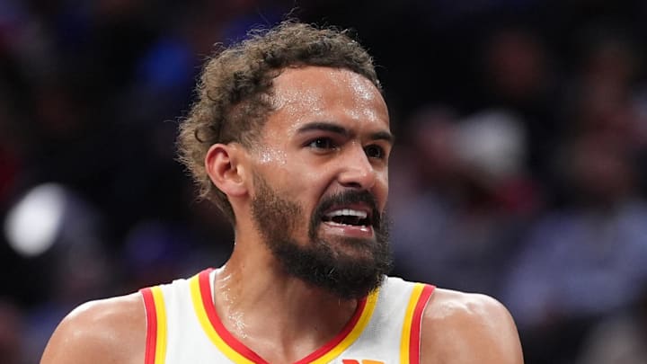Trae Young #11 of the Atlanta Hawks reacts against the Philadelphia 76ers.