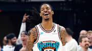 Apr 18, 2025; Memphis, Tennessee, USA; Memphis Grizzlies guard Ja Morant (12) reacts during the first quarter against the Dallas Mavericks at FedExForum. Mandatory Credit: Petre Thomas-Imagn Images