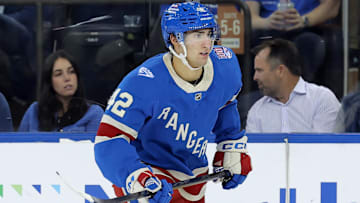 Oct 7, 2025; New York, New York, USA; New York Rangers center Noah Laba (42) skates against the Pittsburgh Penguins during the second period at Madison Square Garden. Mandatory Credit: Brad Penner-Imagn Images