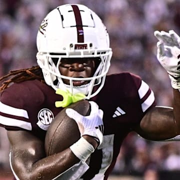 Mississippi State Bulldogs running back Davon Booth runs the ball against the Eastern Kentucky Colonels during the third quarter at Davis Wade Stadium at Scott Field.