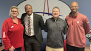 Former Indiana men's basketball player and new Jeffersonville athletic director A.J. Moye (second from left) poses with Jeffersonville principal Pam Hall, assistant athletic director Michael Fitzgerald and fellow former Hoosier and Jeffersonville boys basketball coach Sherron Wilkerson.