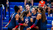 Arizona volleyball team talks during a match.