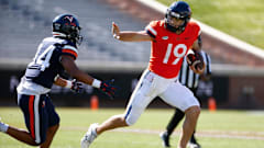 Grady Brosterhous carries the ball during the Virginia football spring game at Scott Stadium.