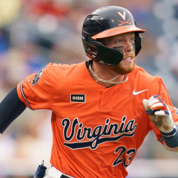 Ethan Anderson runs to first base during the Virginia baseball game vs. Florida at the College World Series in Omaha.