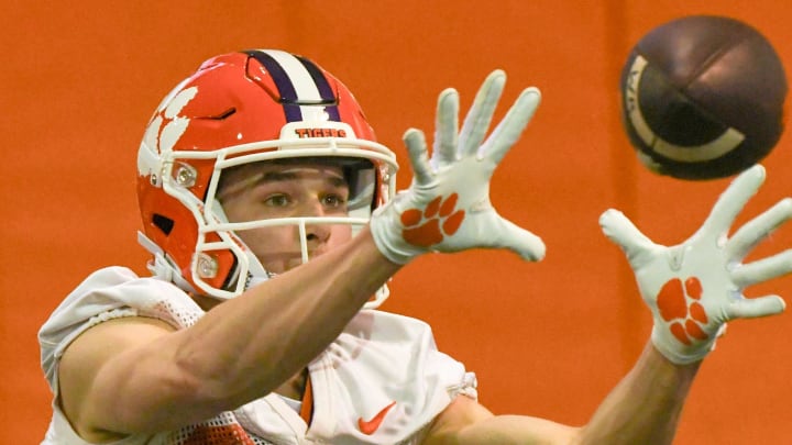 Clemson wide receiver Cole Turner (22) catches a pass in a pass drill during the first day of Spring practice at the Poe Indoor Practice Facility at the Allen N. Reeves football complex in Clemson S.C. Wednesday, February 28, 2024.