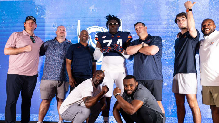 2025 three-star offensive tackle Jim Harris announced his commitment to the Virginia football program.