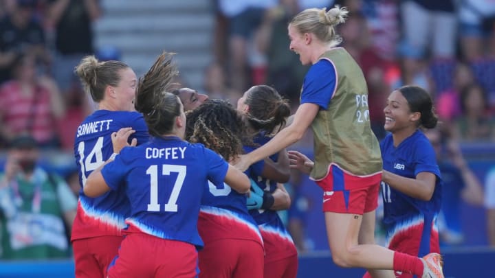 Emily Sonnett and her U.S. Women's National Soccer Team teammates celebrate defeating Brazil to capture the gold medal in women's soccer at the 2024 Paris Olympics.