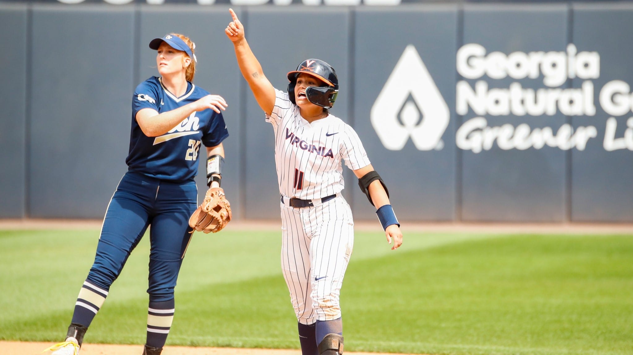 Abby Weaver celebrates after hitting a double during the Virginia softball game at Georgia Tech.