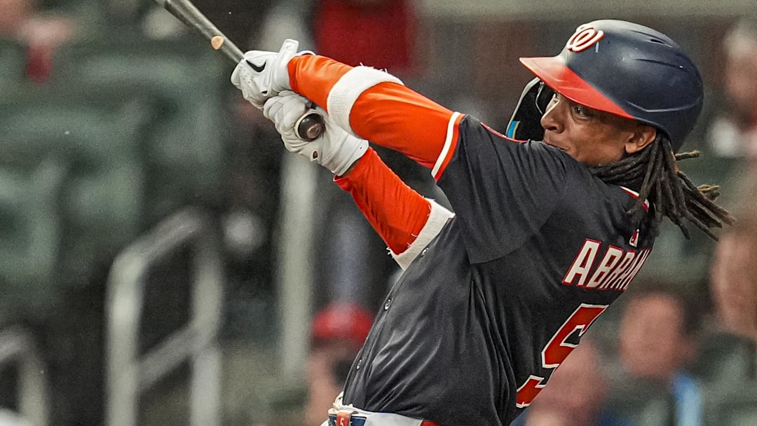 Sep 23, 2025; Cumberland, Georgia, USA; Washington Nationals shortstop CJ Abrams (5) hits a single to drive in a run against the Atlanta Braves during the third inning at Truist Park.