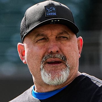 Detroit Lions offensive coordinator John Morton walks on the field for warmup ahead of Cincinnati Bengals game 