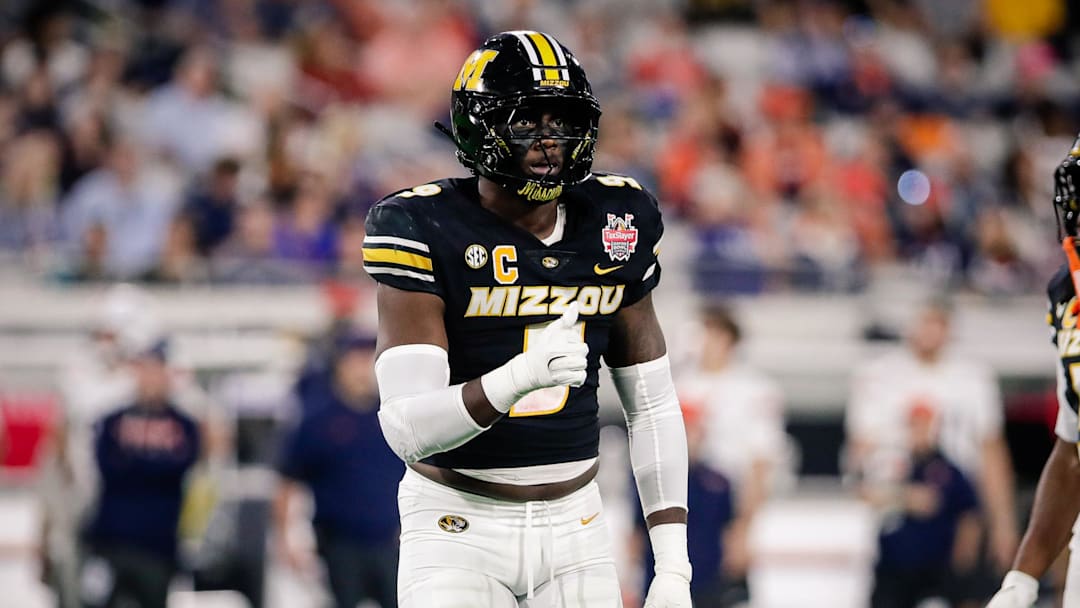 Dec 27, 2025; Jacksonville, FL, USA; Missouri Tigers defensive end Zion Young (9) looks on before a play against the Virginia Cavaliers in the first half at EverBank Stadium. Mandatory Credit: Travis Register-Imagn Images