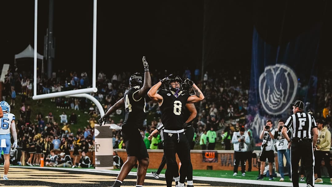 Nov 15, 2025; Winston-Salem, North Carolina, USA; Wake Forest Demon Deacons wide receiver Carlos Hernandez (8) reacts after a play against the North Carolina Tar Heels at Allegacy Federal Credit Union Stadium. Mandatory Credit: Wake Forest Athletics via Imagn Images