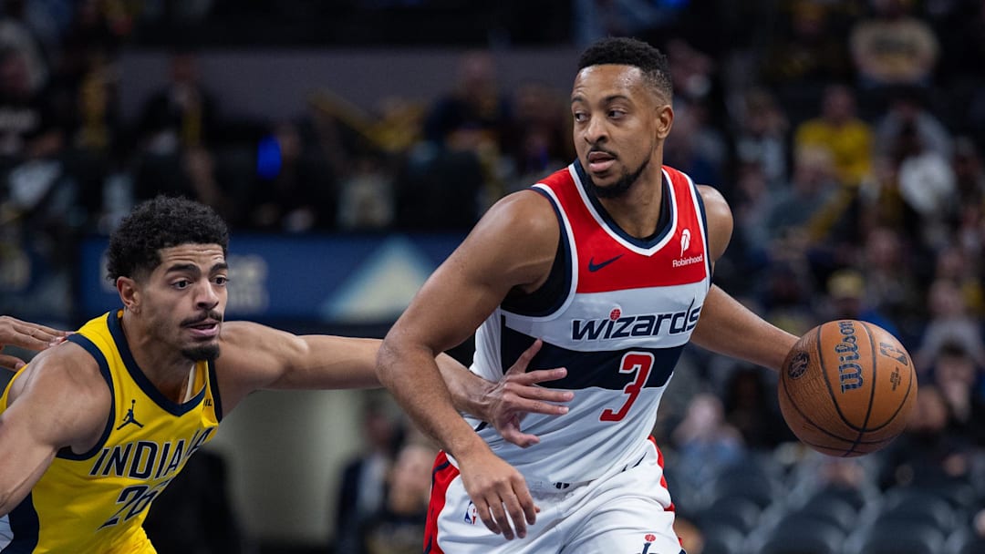 Nov 28, 2025; Indianapolis, Indiana, USA; Washington Wizards guard CJ McCollum (3) dribbles the ball while  Indiana Pacers guard Ben Sheppard (26) defends in the second half at Gainbridge Fieldhouse. Mandatory Credit: Trevor Ruszkowski-Imagn Images