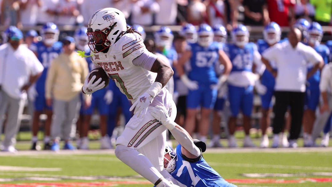 Texas Tech's Terrance Carter Jr. shed the BYU defender after a catch during a Big 12 Conference football game.