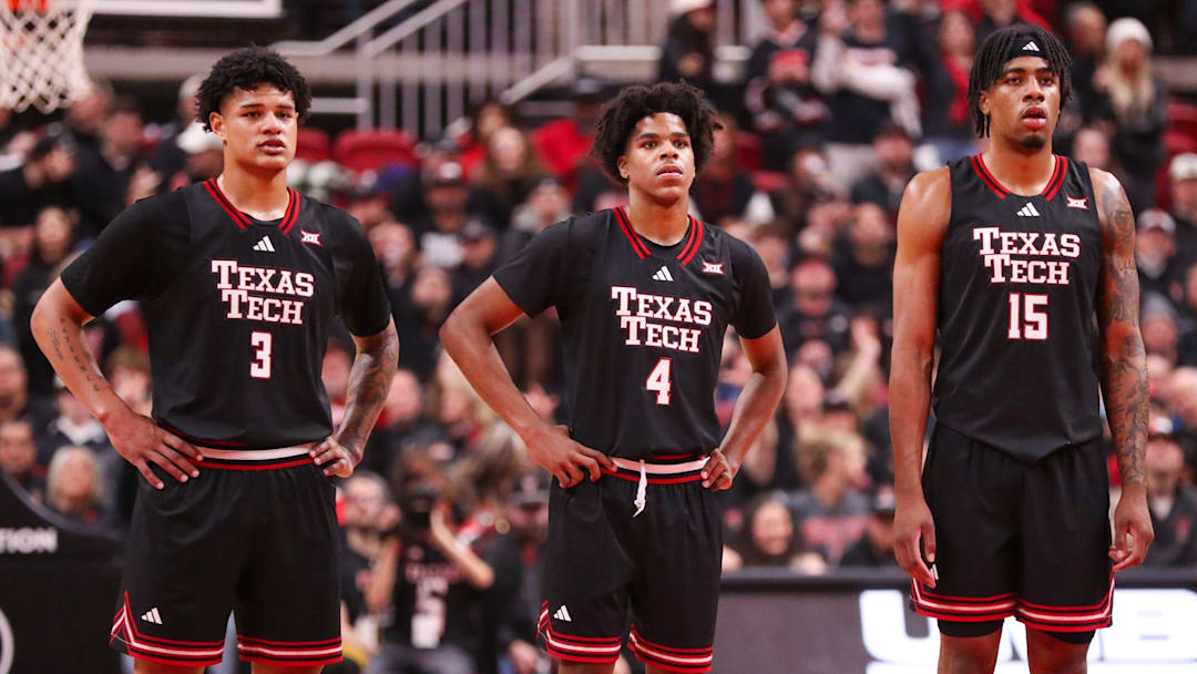 Texas Tech players, from left, LeJuan Watts, Christian Anderson and JT Toppin