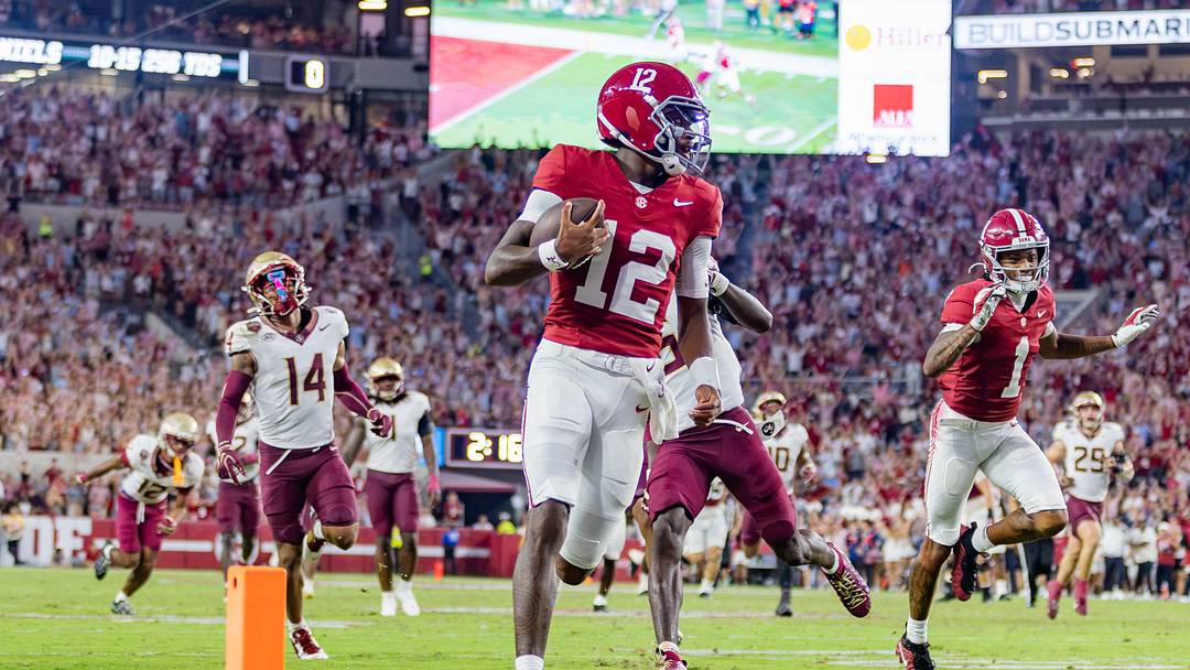Alabama quarterback Keelon Russell runs it in for a touchdown in the second half of the game against FSU on Sept 19, 2026.