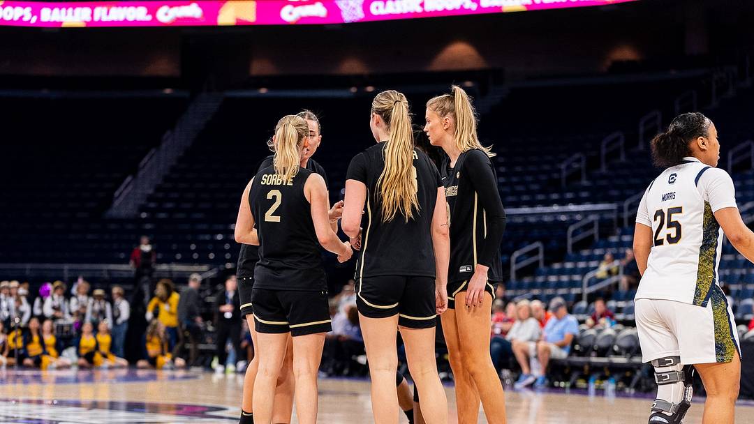 Wake Forest Women's Basketball team huddles against the California Golden Bears in the ACC Tournament.