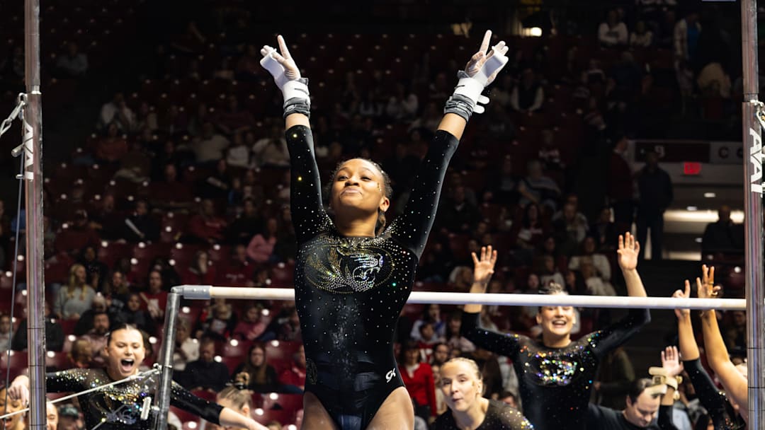 Jan 23, 2026; Tuscaloosa, Alabama, USA; Missouri gymnast Kimarra Echols celebrates a career-best performance on bars during a meet against No. 3 Alabama.