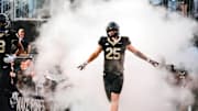 Nov 15, 2025; Winston-Salem, North Carolina, USA; Wake Forest Demon Deacons tight end Harry Lodge (25) runs onto the field before the game against the North Carolina Tar Heels at Allegacy Federal Credit Union Stadium. Mandatory Credit: Wake Forest Athletics via Imagn Images