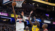 Nov 28, 2025; Indianapolis, Indiana, USA; Washington Wizards center Alex Sarr (20) shoots the ball while Indiana Pacers forward Pascal Siakam (43) defends in the second half at Gainbridge Fieldhouse. Mandatory Credit: Trevor Ruszkowski-Imagn Images
