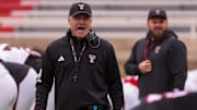 Head coach Joey McGuire offers words of encouragement before the Texas Tech football team's spring game
