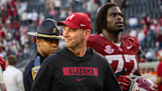Alabama Head Coach Kalen DeBoer smiling while leaving the field after the game against Eastern Illinois on November 22, 2025.