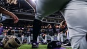 TCU Baseball team prays before final game of the season.