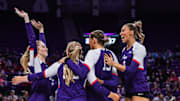 TCU Volleyball players celebrate a point scored against Texas Tech.