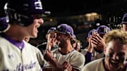 Northwestern celebrates after win at Wrigley Field.