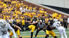 Iowa's Tory Taylor punts during a game against Western Michigan in 2023. (Rob Howe/HN) 