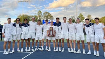 Virginia men's tennis celebrates after defeating South Carolina in the Super Regional Round of the 2024 NCAA Men's Tennis Championship at Boar's Head in Charlottesville.