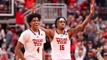 Texas Tech players Christian Anderson (4) and JT Toppin 