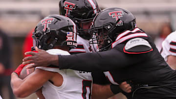 Lee Hunter wraps up Quinten Joyner for a tackle during the Texas Tech football team's spring game, Saturday, April 19, 2025, at Jones AT&T Stadium.