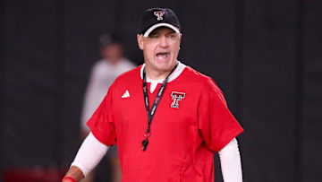 Head coach Joey McGuire walks the field during Texas Tech football practice, Monday, August 11, 2025, at the Womble Football Center.
