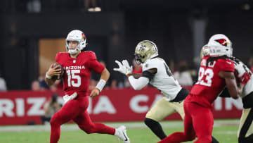 Arizona Cardinals quarterback Desmond Ridder (15) runs with the ball during a preseason game on Aug. 10, 2024 at State Farm Stadium in Glendale.