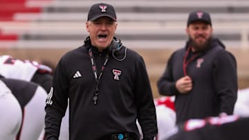 Head coach Joey McGuire offers words of encouragement before the Texas Tech football team's spring game