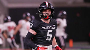Texas Tech's Cole Wisniewski goes through a drill during spring practice.