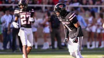 Texas Tech's A.J. McCarty celebrates making a tackle.