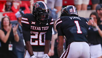 Texas Tech's Reggie Virgil celebrates his touchdown with J'Koby Williams during a Big 12 Conference football game, Saturday, Nov. 15, 2025, at Jones AT&T Stadium.